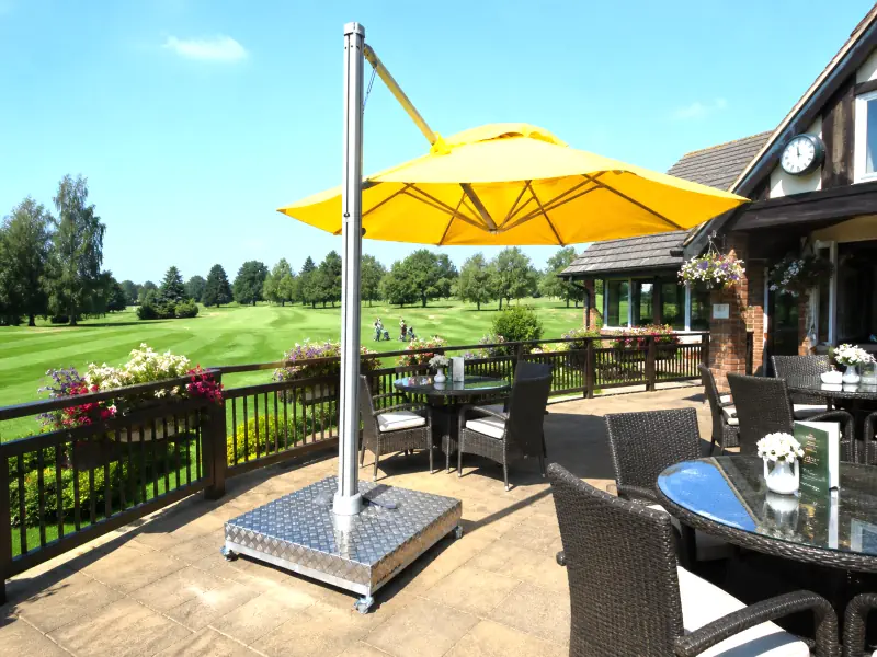 Malaga cantilever parasol with yellow canopy